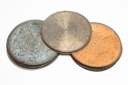 APPROXIMATELY FORTY-FIVE MUSIC BOX DISKS.