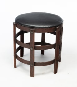 ATTRIBUTED TO STICKLEY BROTHERS (GRAND RAPIDS, MICHIGAN) ARTS AND CRAFTS OAK AND LEATHER STOOL.
