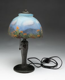 HANDEL (MERIDEN, CONNECTICUT) PATINATED METAL AND REVERSE PAINTED BOUDOIR LAMP.