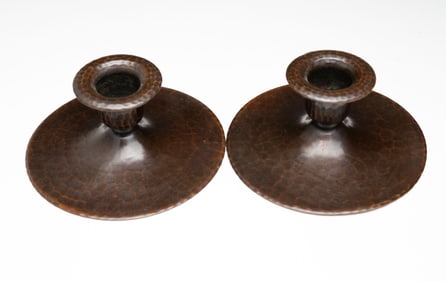 PAIR OF ROYCROFT (EAST AURORA, NEW YORK) ARTS AND CRAFTS HAMMERED COPPER ORB CANDLESTICKS.