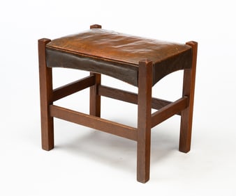J.M. YOUNG & SONS (CAMDEN, NEW YORK) ARTS AND CRAFTS OAK AND LEATHER FOOTSTOOL.