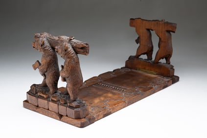 BLACK FOREST CARVED WALNUT EXPANDING DESKTOP BOOK RACK.