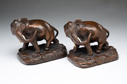 PAIR OF ARMOR BRONZE CORPORATION (NEW YORK, NEW YORK) ELEPHANT-FORM BOOKENDS.