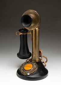 AUTOMATIC ELECTRIC COMPANY (CHICAGO, ILLINOIS) BRASS CANDLESTICK TELEPHONE WITH ROTARY DIAL.