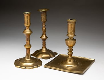 THREE ENGLISH BRASS CANDLESTICKS, INCLUDING WILLIAM LEE.