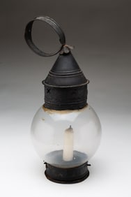 TIN AND BLOWN GLASS CANDLE LANTERN.