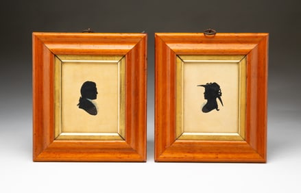 PAIR OF GOUACHE AND WATERCOLOR SILHOUETTE PORTRAITS OF A MAN AND A WOMAN.