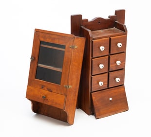 TWO AMERICAN HANGING CABINETS.