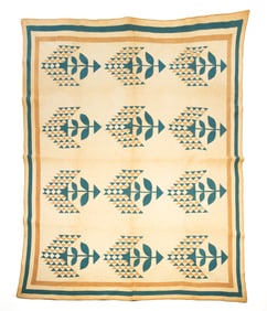 AMERICAN PIECED QUILT IN A "TREE OF LIFE" VARIATION PATTERN.