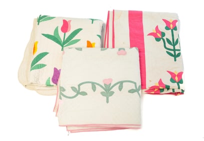 THREE AMERICAN APPLIQUE FLORAL QUILTS.