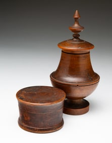 TWO TREENWARE LIDDED JARS.