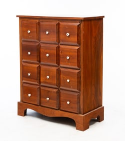 AMERICAN WALNUT TWELVE-DRAWER APOTHECARY CHEST.