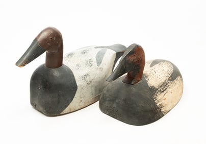 TWO AMERICAN CARVED AND PAINTED CANVASBACK DRAKE DUCK DECOYS, ONE SIGNED RHMC.