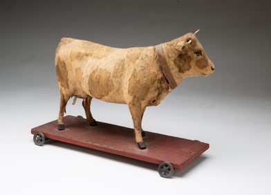 GERMAN COW PULL TOY.