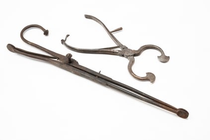 FORGED EMBER TONGS AND A PAIR OF SUGAR NIPS.