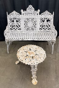 VICTORIAN CAST IRON GARDEN BENCH PLUS SIDE TABLE.