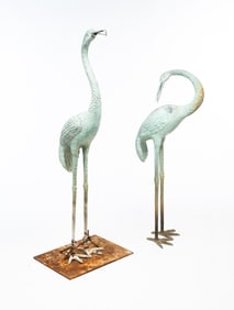 TWO LARGE COPPER STANDING CRANES.