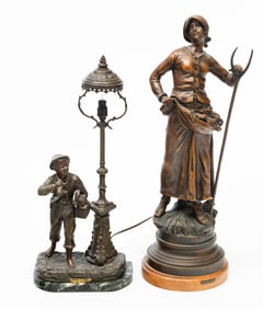 TWO EUROPEAN FIGURAL STATUES.