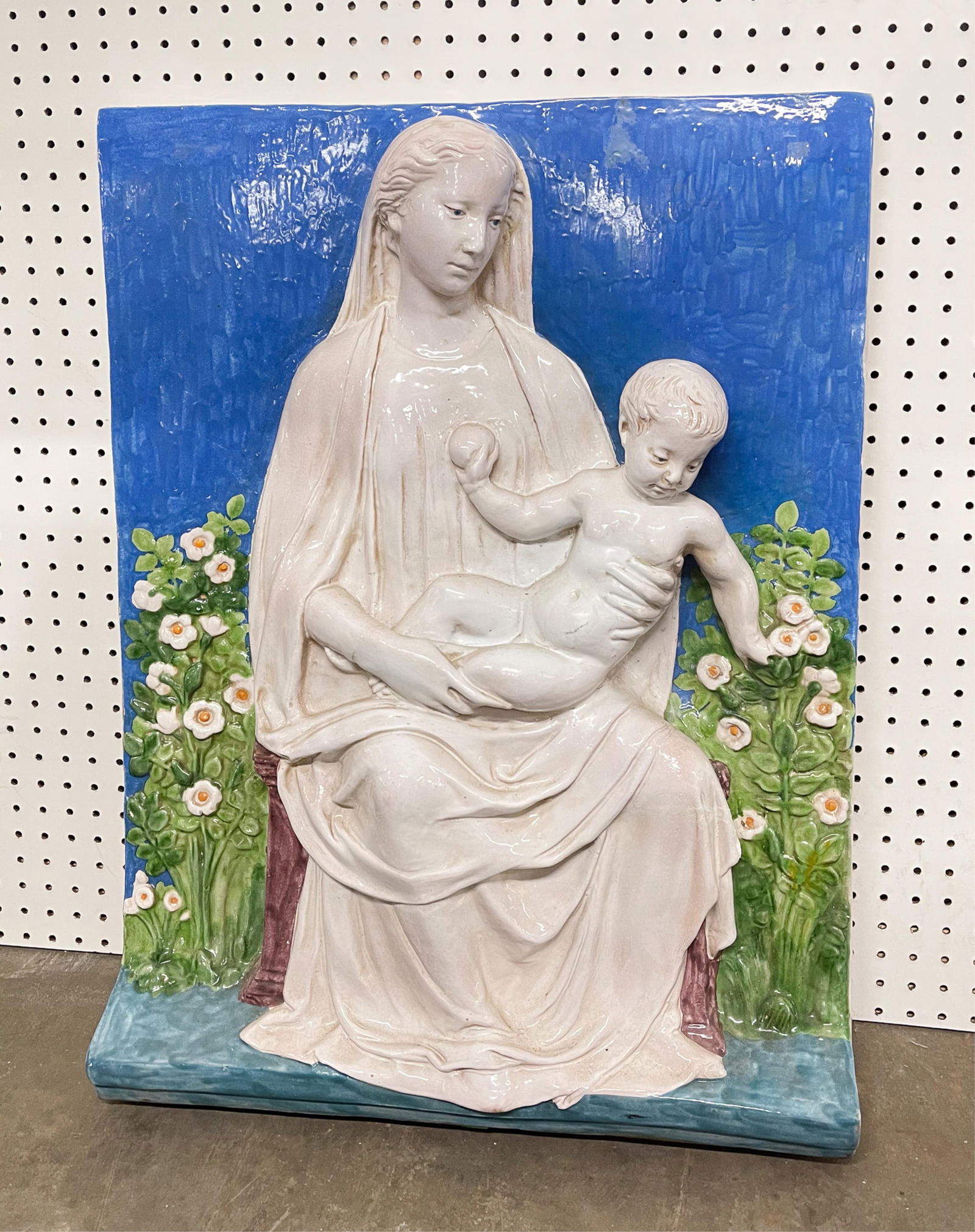 AFTER LUCA DELLA ROBBIA (ITALIAN, 1399-1481) "MADONNA DEL ROSETO" LARGE GLAZED TERRACOTTA RELIEF: Italy (Florence), 20th Century. Glazed terracotta. Probably made by Ditta Luca Della Robbia. Depicting the Madonna and baby Jesus in a rose garden, after the original in the National Museum of Bargell