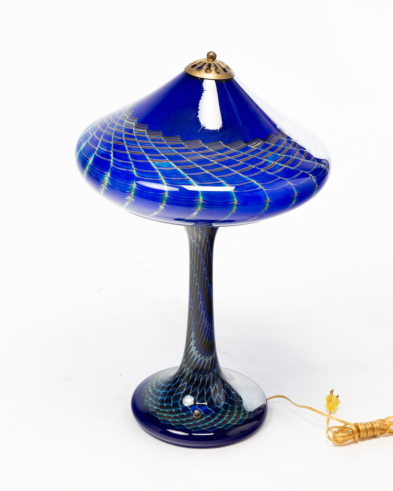 JOSEPH CLEARMAN (B. 1946) AMERICAN ART GLASS TABLE LAMP.: American, 20th Century. Blown glass base and shade. Wide base with long stem and matching round shade with pulled design. Signed to inside base. 25"h. 16"w.