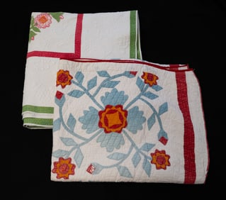 TWO AMERICAN HAND-STITCHED APPLIQUÉ QUILTS.