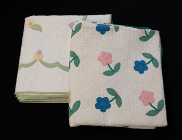 TWO AMERICAN HAND-STITCHED APPLIQUÉ QUILTS.