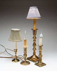 FOUR BRASS CANDLESTICK LAMPS.