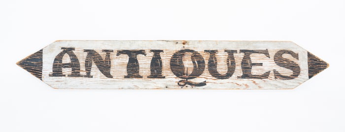 PAINT DECORATED "ANTIQUES" TRADE SIGN.