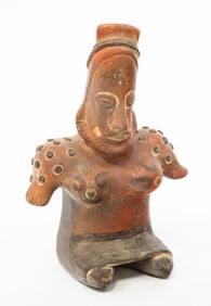 JALISCO SEATED TERRACOTTA FEMALE FIGURE.
