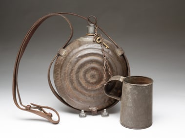CIVIL WAR ERA BULLSEYE CANTEEN AND TIN CUP.