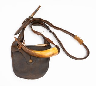 AMERICAN LEATHER HUNTING BAG WITH POWDER HORN, ANTLER-HANDLED KNIFE, AND PRIMER.
