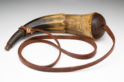 AMERICAN CARVED AND DECORATED POWDER HORN.