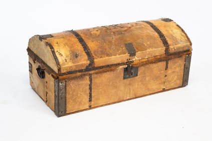 AMERICAN HIDE-COVERED PINE TRUNK WITH BRASS TACK TRIM.