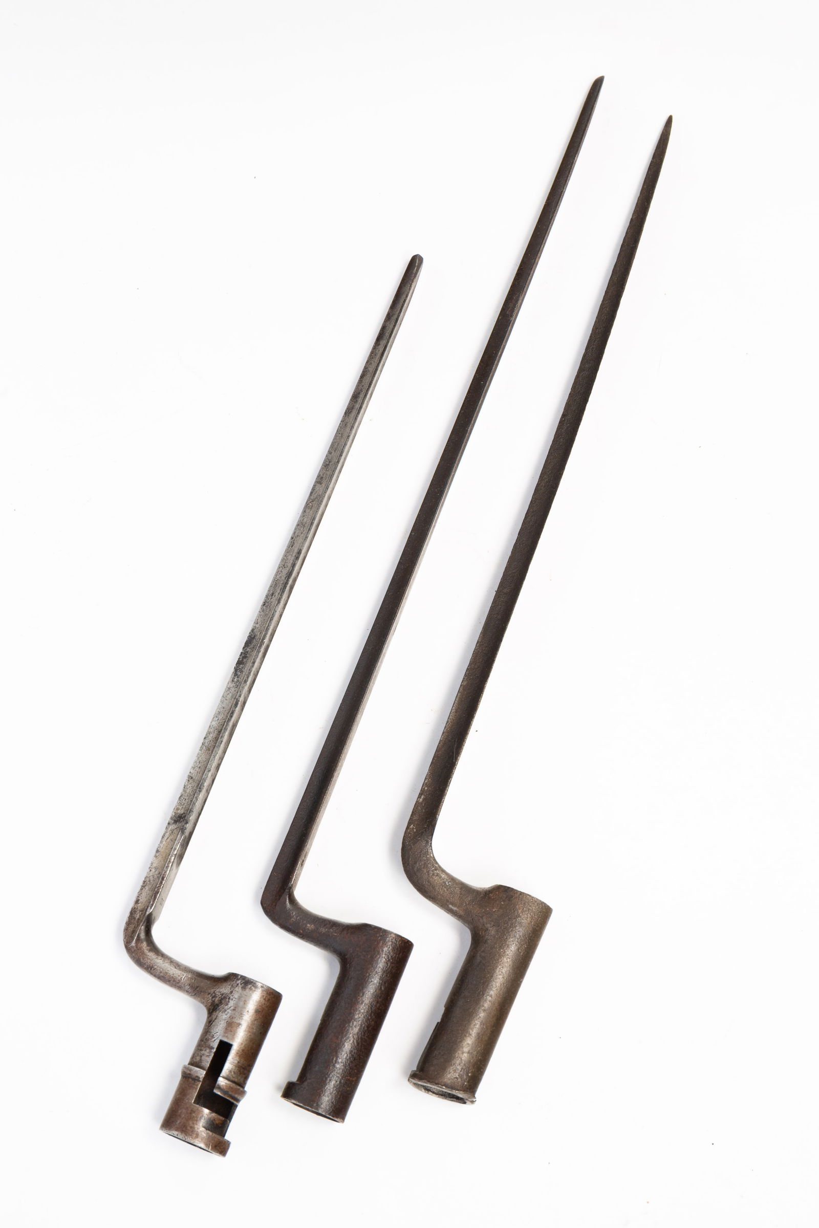 THREE AMERICAN CIVIL WAR BAYONETS.: American, 19th Century. One marked "M" for Maryland, one marked "US", and the last marked "US/SC". From 15.5"h. to 19"h.Provenance: From the Lifetime Collection of the late Ken Hanna (Chester, New Jer