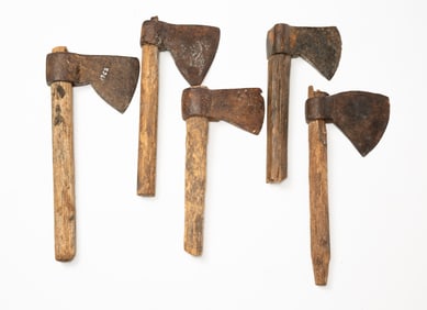 FIVE AMERICAN PRIMITIVE FORGED IRON AXES.