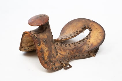 PRIMITIVE RAWHIDE CAVALRY SADDLE.