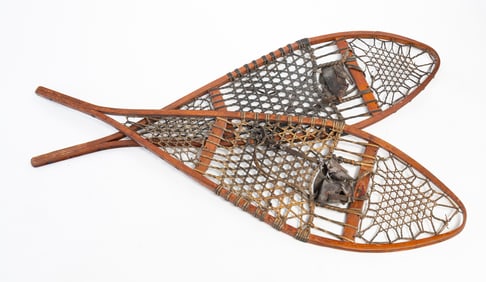 PAIR OF ELLINGWOOD TURNING COMPANY (OXFORD, MAINE) WOOD AND LEATHER SNOW SHOES.