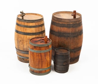 FOUR AMERICAN LIQUOR BARRELS.
