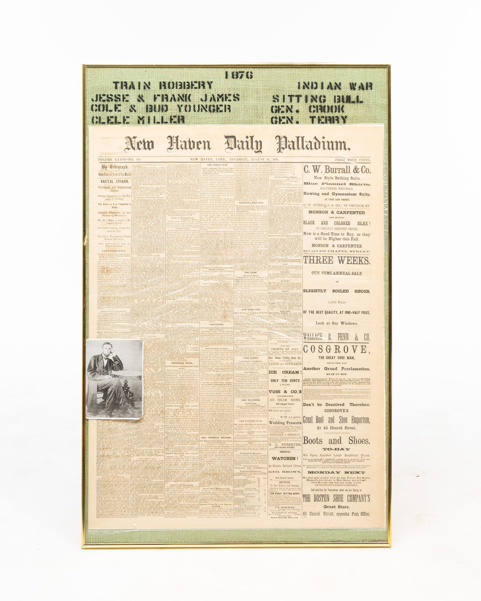 FRAMED NEW HAVEN DAILY PALLADIUM NEWSPAPER, DATED AUGUST 10, 1876.: American, 1876. Newspaper in protective sleeve, framed with a burlap bag extolling the biggest news of that day's paper, which includes news about the Missouri Train Robberies and The Indian War.Frame