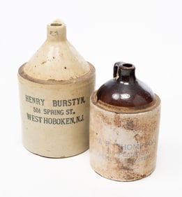TWO AMERICAN ADVERTISING STONEWARE JUGS.