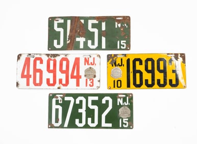 FOUR NEW JERSEY PORCELAIN ENAMELED LICENSE PLATES.