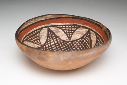 NATIVE AMERICAN POLYCHROME DECORATED TERRACOTTA BOWL.