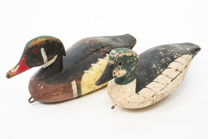 AMERICAN CARVED AND PAINTED MERGANSER AND GOLDENEYE DUCK DECOYS.