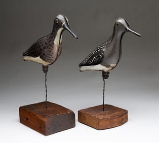 TWO AMERICAN PAINTED TIN SHOREBIRD DECOYS WITH PINE STANDS.