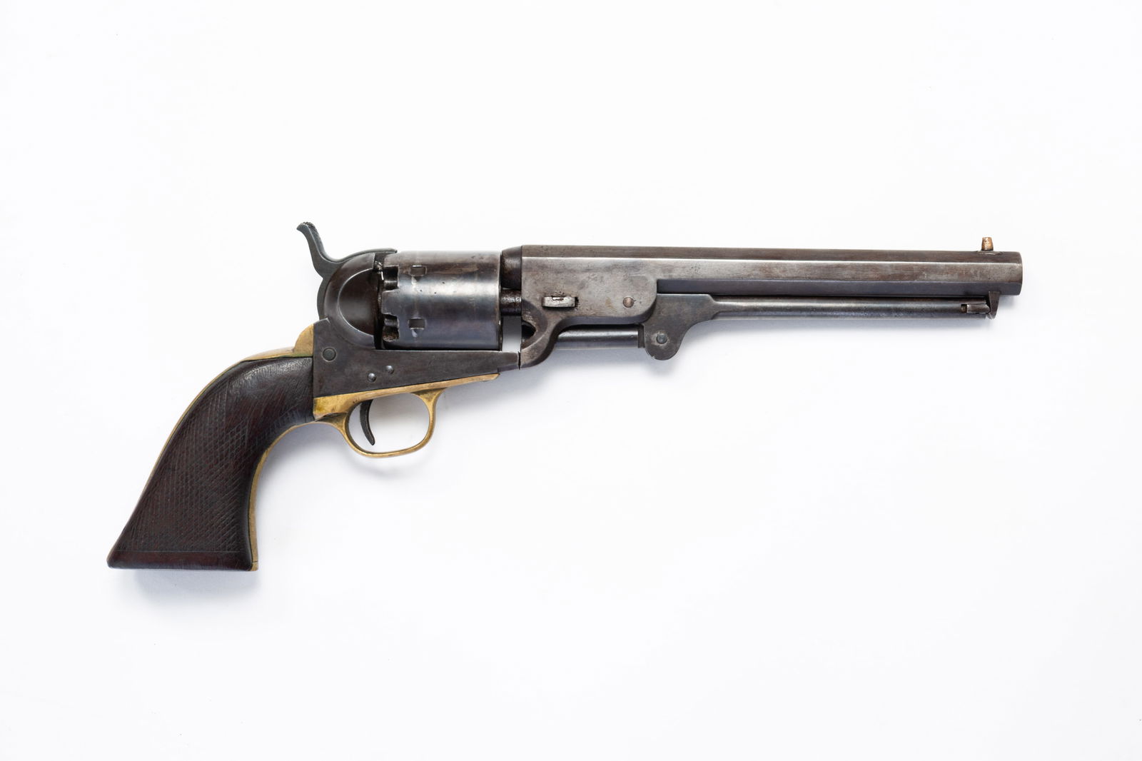 AMERICAN COLT MODEL 1851 NAVY REVOLVER.: American, 19th Century. Walnut. Checkered grips, iron frame, brass back stop, 36 caliber and Serial number 79757. 13.25"l.
