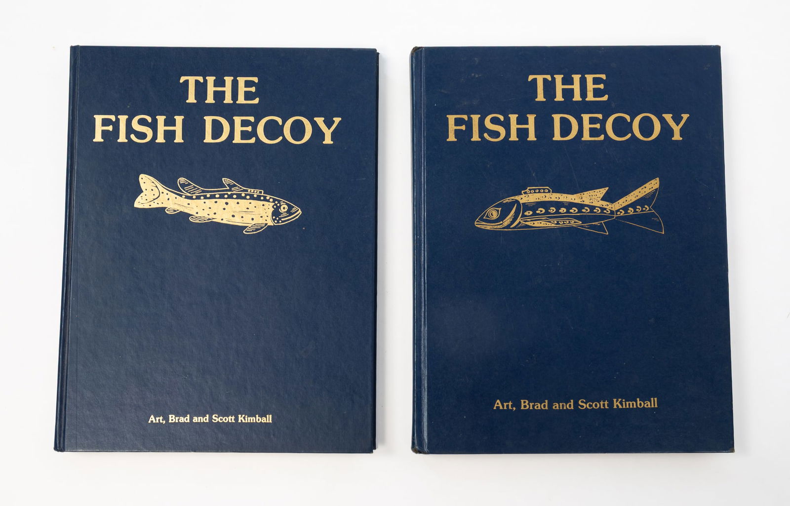 THE FISH DECOY BOOK VOLUME I AND II BY ART, BRAD, AND SCOTT KIMBALL.: American, 20th Cenrurty. Art, Brad and Scott Kimball, "The Fish Decoy" and "The Fish Decoy Volume II", Fourth printing and First printing, Aardvark Publications, Inc., 1986 and 1987. Volume II is the