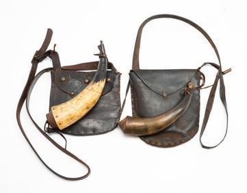 TWO LEATHER SINGLE-POCKET HUNTING BAGS WITH POWDER HORNS.
