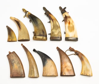 GROUP OF TEN POWDER HORNS, INCL. THREE BRASS-MOUNTED FLAT EXAMPLES.