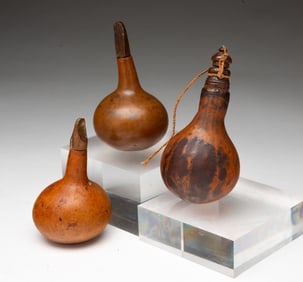 THREE AMERICAN SHOT FLASKS.