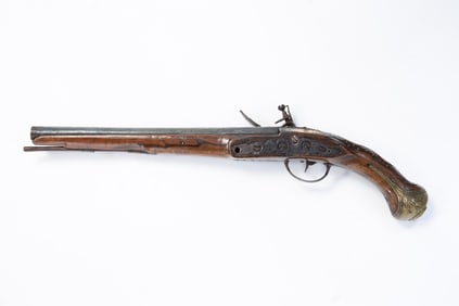 EUROPEAN FLINT LOCK PISTOL WITH BONE AND BRASS INLAY.